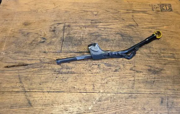 Oil level dip stick