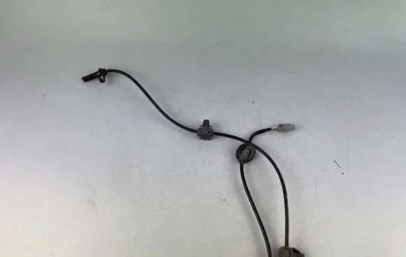 Subaru Legacy ABS brake wheel speed sensor 27540AJ000