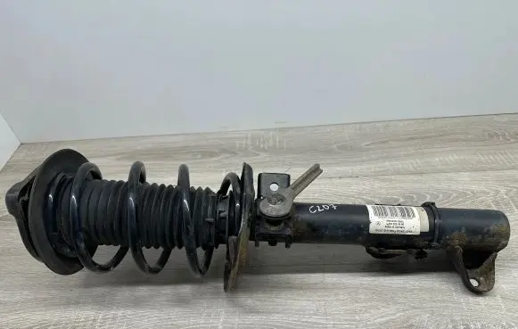 Mercedes-Benz E C207 W207 Front shock absorber with coil spring A2043202866