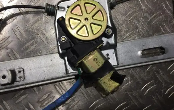 Mazda 323 Front door window regulator motor