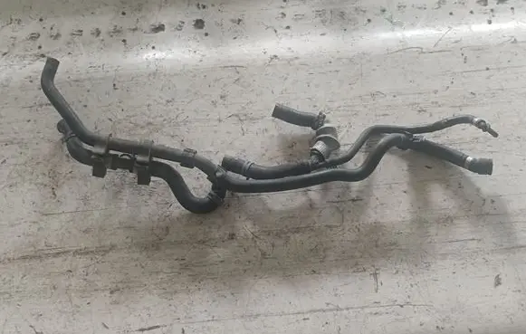 Volkswagen Touareg II Engine coolant pipe/hose 1J0121087D