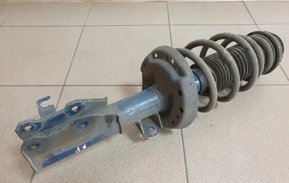 Opel Astra J Front shock absorber with coil spring