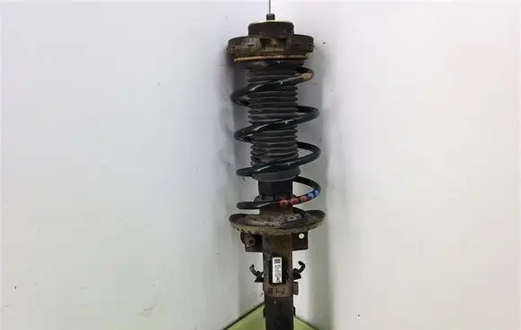 Volkswagen Polo Front shock absorber with coil spring 6Q0413031BM