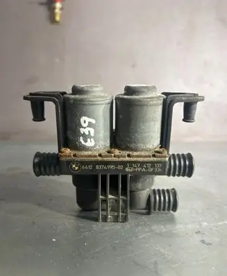 Coolant heater control valve