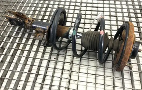 Mitsubishi Lancer VIII Front shock absorber/damper