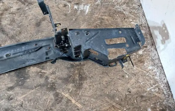 Top upper radiator support slam panel