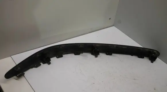 Rear bumper trim bar molding