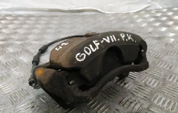 Volkswagen Golf VII Front brake caliper 6791G