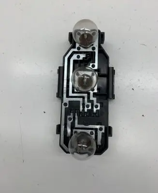 Tail light bulb cover holder