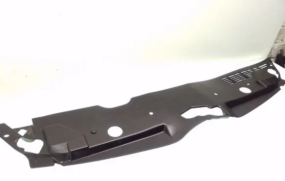 Engine bonnet/hood lock trim molding