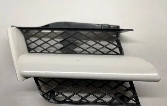 Mitsubishi Outlander Front bumper upper radiator grill MR971688