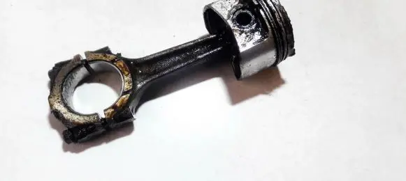 Piston with connecting rod