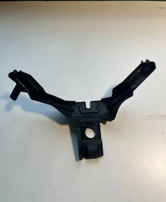 Engine bonnet/hood lock trim molding