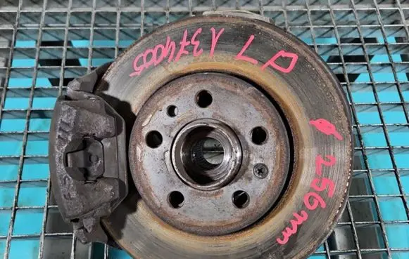 Front wheel hub spindle knuckle