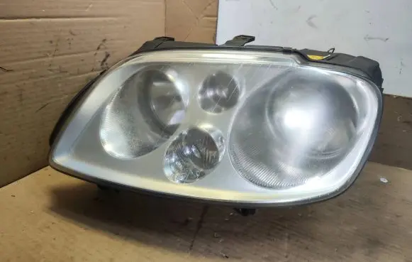 Volkswagen Touran I Headlight/headlamp 1305235777 1305235779