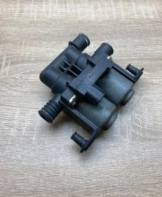 Coolant heater control valve