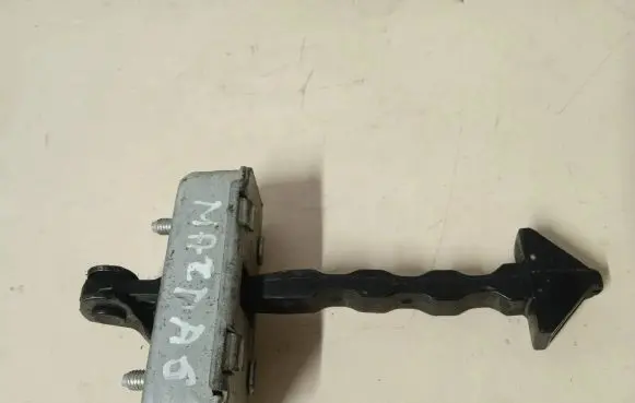 Mazda 6 Rear door check strap stopper