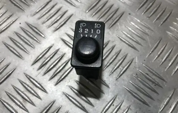 Nissan Maxima Headlight level height control switch