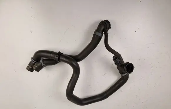 Volkswagen Golf VII Engine coolant pipe/hose 5Q0121049AC