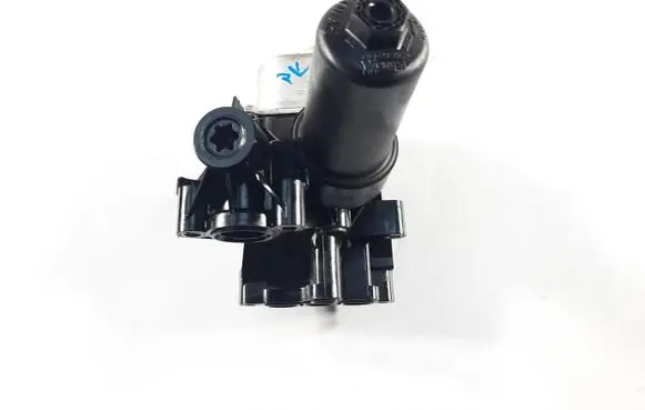 Volkswagen Tiguan Oil filter mounting bracket 05L115389AE