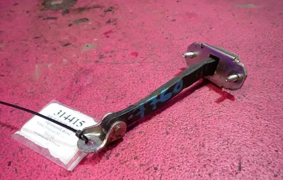 Front door check strap stopper