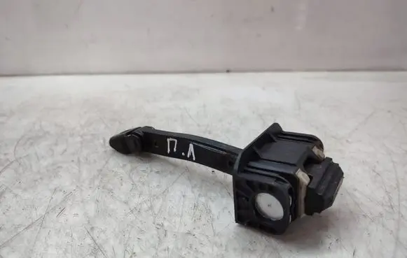 Front door check strap stopper