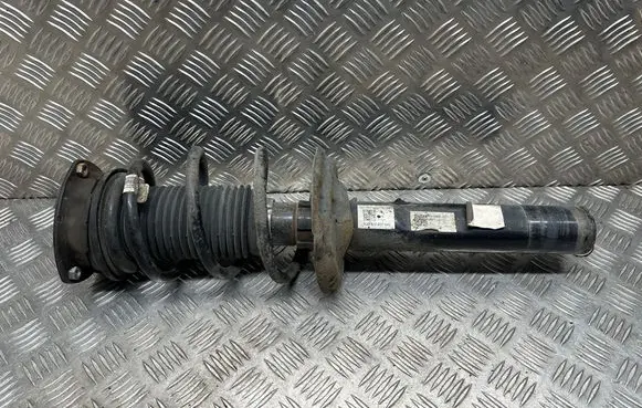 Volkswagen Golf VII Front shock absorber with coil spring 5Q0412037QH