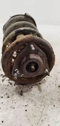 Mitsubishi Lancer X Front shock absorber with coil spring