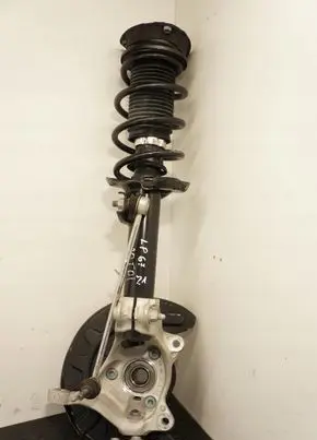 Volkswagen Golf VII Front shock absorber with coil spring 5q0407257a