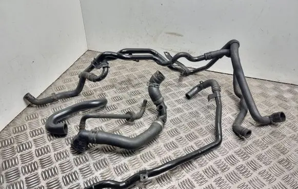 Volkswagen Touran II Engine coolant pipe/hose 1k0121070br 1k0122101kp