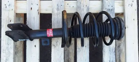 Front shock absorber with coil spring
