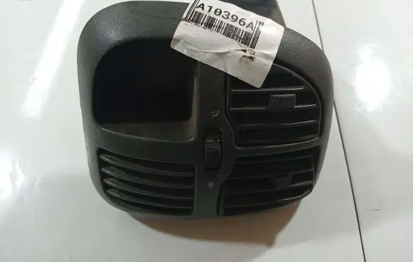 Dash center air vent grill