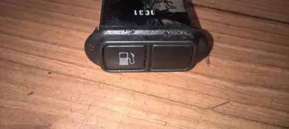 KIA Carnival Fuel tank opening switch 
