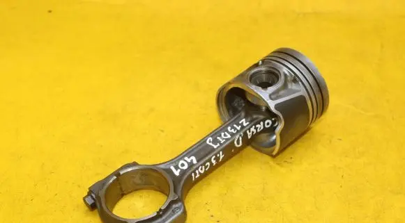 Opel Corsa D Piston with connecting rod 73502643