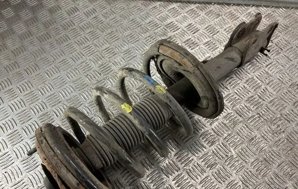 Front shock absorber with coil spring