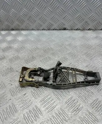 Rear door exterior handle/bracket