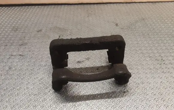 Opel Insignia A Brake caliper pad carrier rear 