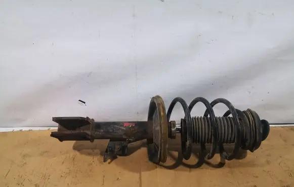 Citroen C4 I Front shock absorber with coil spring