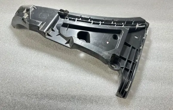 Front bumper mounting bracket