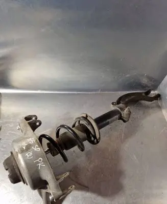 Front shock absorber with coil spring