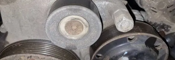 Generator/alternator belt tensioner