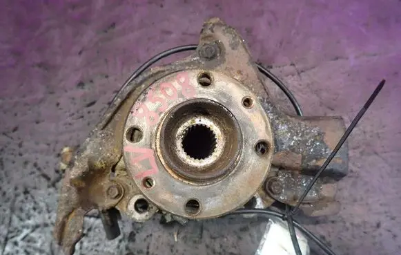 Front wheel hub spindle knuckle