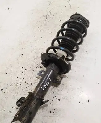 Front shock absorber with coil spring