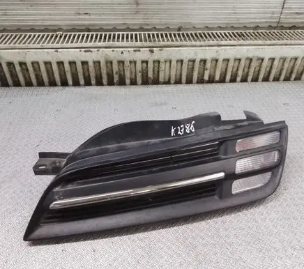 Nissan Micra Front bumper upper radiator grill 62330X600
