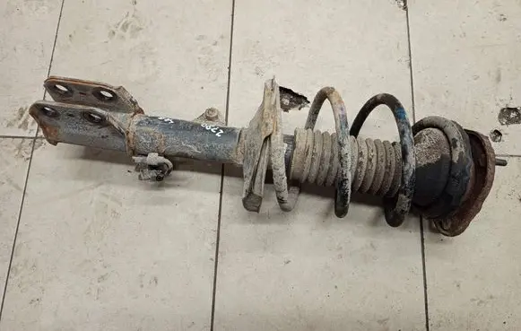 Toyota Avensis T250 Front shock absorber with coil spring