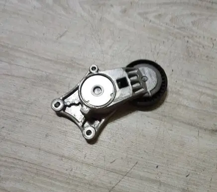 Fiat 500X Generator/alternator belt tensioner 55274034