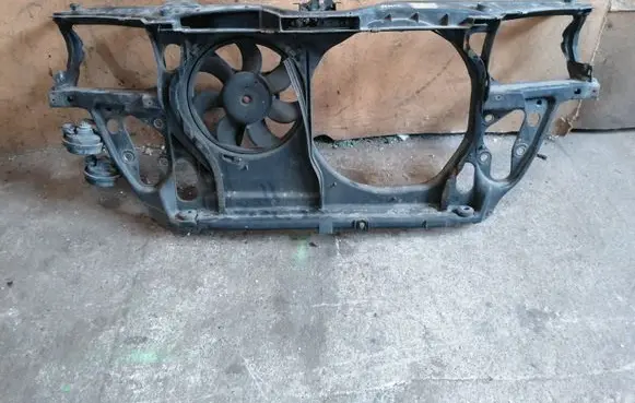Radiator support slam panel