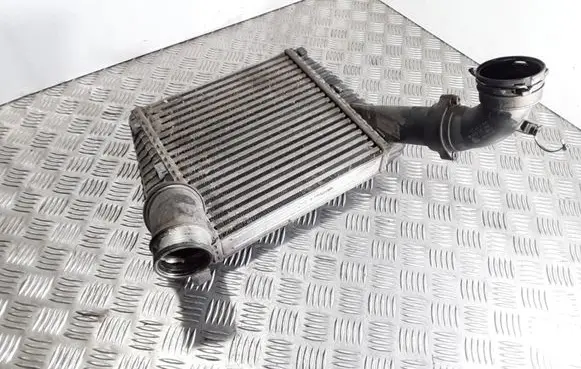 Volkswagen Touareg I Intercooler radiator 7L6145803C