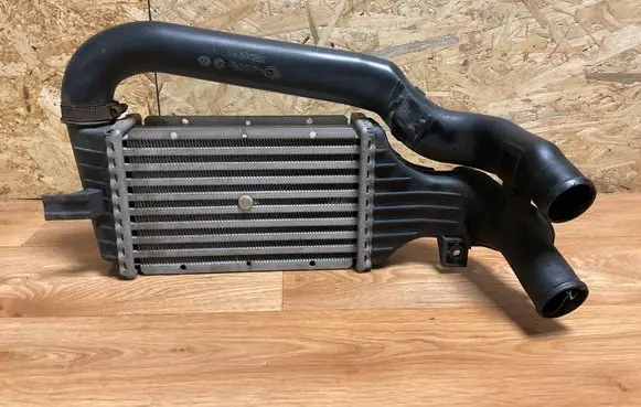 Opel Zafira A Intercooler radiator 24406701 57965
