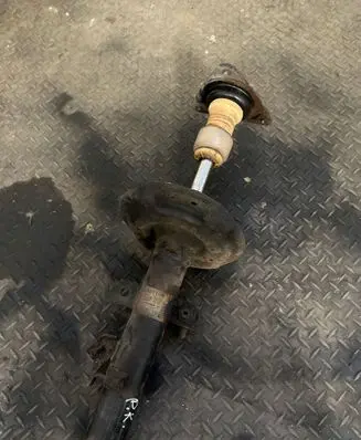 Nissan Qashqai Front shock absorber/damper 54303HV01A